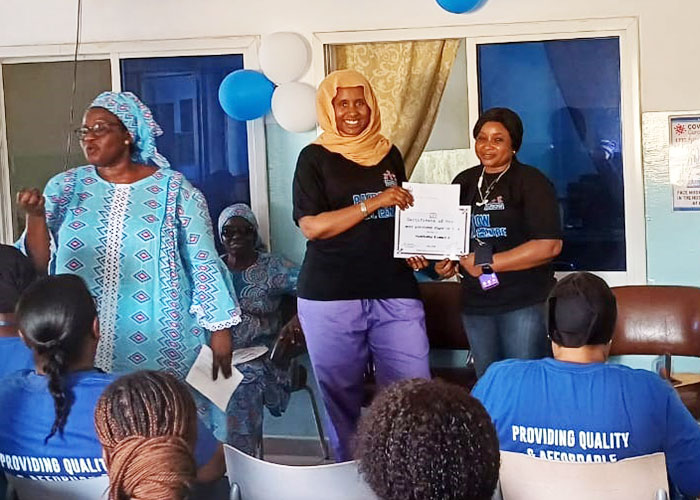 ©BAFROW Medical Centre Most Efficient Staff of the Year Mariama Camara; OPD Supervisor (right)
